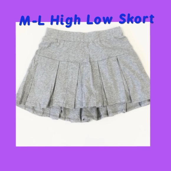 JNK Dresses & Skirts - Pleaded High Low Tennis SKORT. Size Large. Very Mini. Full back coverage.